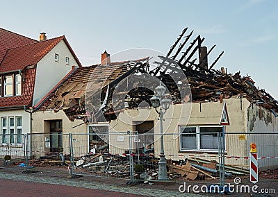 Collapsed house after a devastating fire Editorial Stock Photo