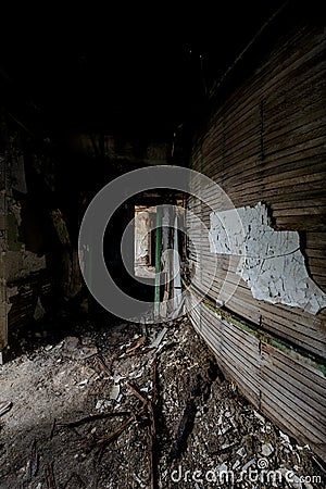 Collapsing Hallway - Abandoned Hospital & Nursing Home Stock Photo