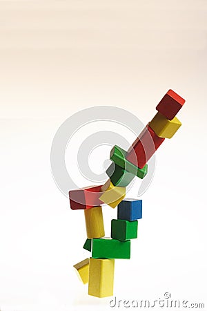 Collapsing set of colorful wooden blocks Stock Photo