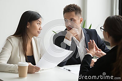 Colleagues discussing job applicant resume Stock Photo