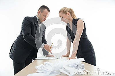 Colleagues discussing something with a heap of Stock Photo