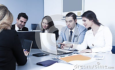 Colleagues in negotiations in office Stock Photo