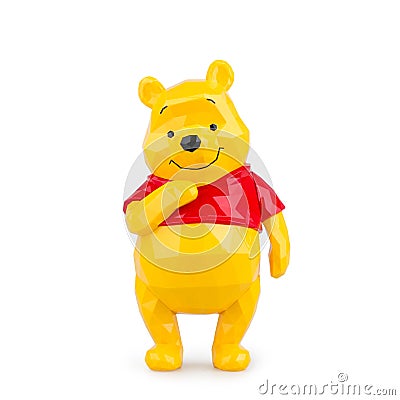 Collectible toy bear Winnie the Pooh on a white background Editorial Stock Photo