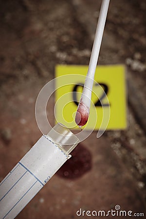 Collecting evidences of blood stains Stock Photo