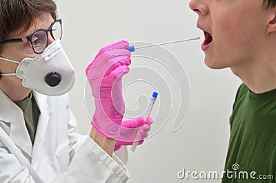 Collecting a nasopharyngeal nose and throat swab Stock Photo