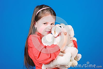 Collecting toys hobby. Cherishing memories of childhood. Small girl smiling face with toys. Happy childhood. Little girl Stock Photo