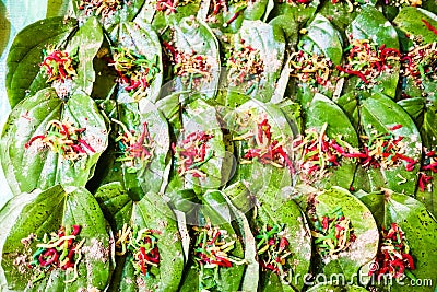 Collection of banarasi paan betel leaf with masala displayed with displayed for sale at a shop. Stock Photo