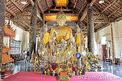 A Collection of Buddha statues in the main prayer hall Editorial Stock Photo