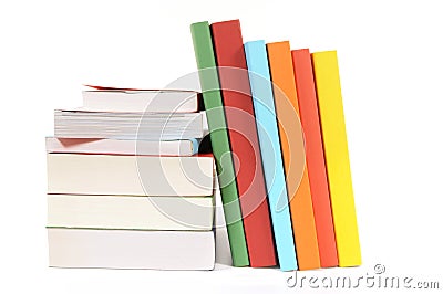 Book stack, leaning, several, isolated white background Stock Photo