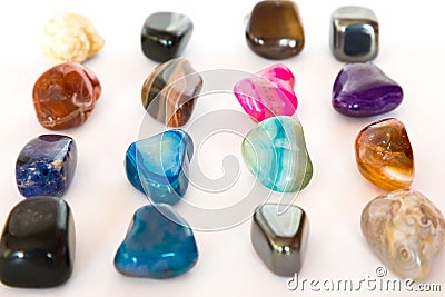 Collection of colorful semiprecious gemstones on white background Stock Photo