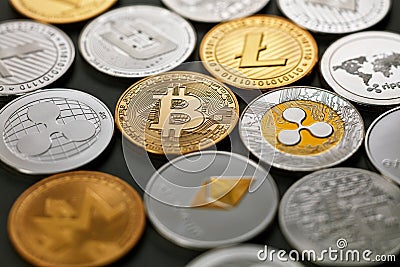 Pattern of coins LTC, ETH, BTC, XMR, XRP on a dark background. Business concept. Editorial Stock Photo