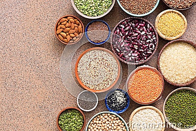 Collection different of legumes, beans, grains and seeds in bowls. Top view, flat lay, copy space Stock Photo