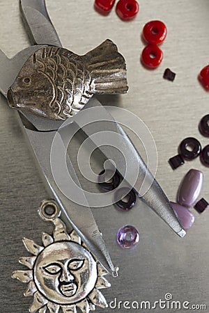 jewelry items and forceps Stock Photo