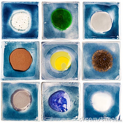 Collection of handmade glazed ceramic tiles Stock Photo