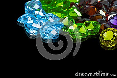 Collection of many different natural gemstones amethyst,Citrine, Blue topaz,Peridot,Garnet Stock Photo