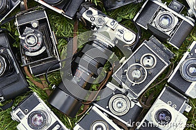 Collection of old vintage retro film analogue cameras. Editorial Stock Photo