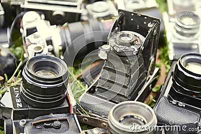 Collection of old vintage retro film analogue cameras. Editorial Stock Photo