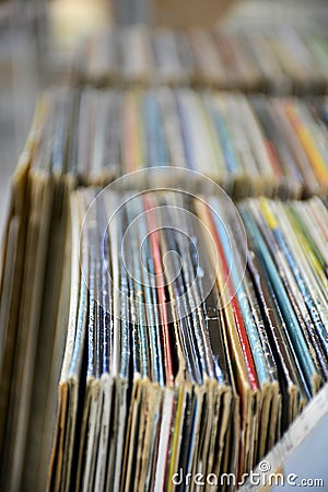 Collection of old vinyl record lps with sleeves in storage shelf Stock Photo