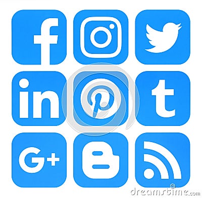 Collection of popular blue social media icons printed on paper Editorial Stock Photo