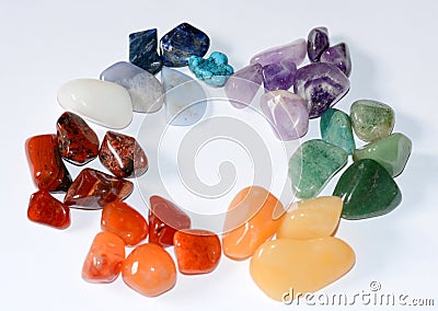 Collection of raw mineral stones in order and colors of chakras Stock Photo