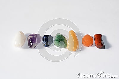 Collection of raw mineral stones in order and colors of chakras Stock Photo