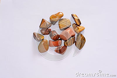 Collection of raw shiny tiger eye and jasper mineral Stock Photo