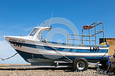 Fishing boat on a pebble beach Editorial Stock Photo