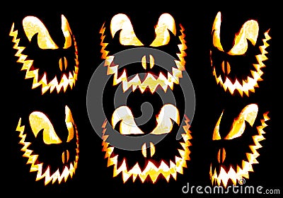 Collection of scary Halloween pumpkin Jack o lantern faces glowing red and yellow Stock Photo