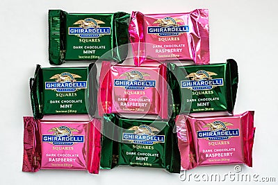 Collection of Small Ghirardelli Chocolate Squares and Trademark Logo Editorial Stock Photo