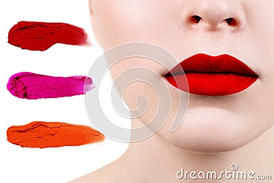 Collection of smudged lipsticks near perfect female lips. Stock Photo