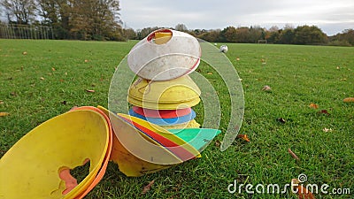 A close up of cone stack with footballs in the background Stock Photo