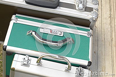 Three locked briefcases Stock Photo