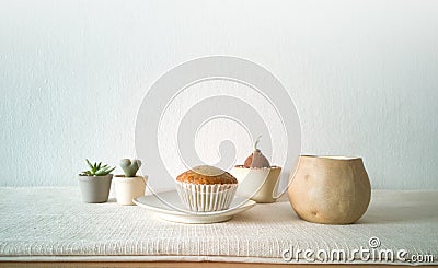 Collection of various potted cactus house plants, cupcake with a cup of coffee - image Stock Photo