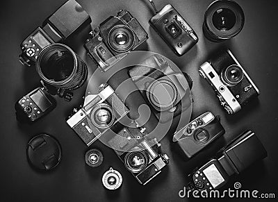 Collection Vintage Film And Digital Cameras, On Black Background, Top View Stock Photo