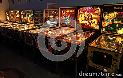 Collection of vintage pinball machines in arcade Editorial Stock Photo