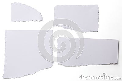 Collection of white ripped pieces of paper on white Stock Photo