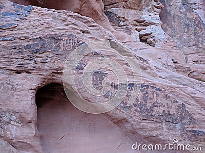 Collections of ancient petroglyphs of man and sun on sandstone Stock Photo