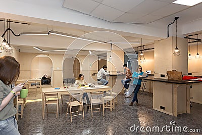 College Campus Kitchenette Area and Young People around Stock Photo