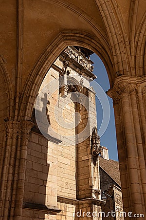 Collegial Notre Dame in Beaune and shadow of a cross Stock Photo