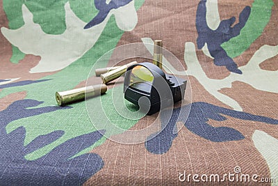 Collimator sight and bullets. Stock Photo