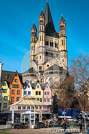 Cologne, Germany: Famous Fish Market Colorful Houses and Gross St Martin Church Editorial Stock Photo