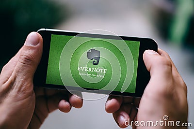 COLOGNE, GERMANY - MARCH 02, 2018: Closeup of iPhone Screen with EVERNOTE LOGO Editorial Stock Photo