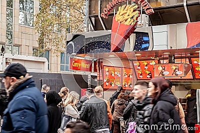 Selective blur on a fastfood sign indicating it's selling typical german street food such a Editorial Stock Photo