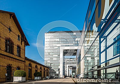 Cologne Koln, Germany: Rheinauhafen, Old Kolner Harbor, with modern Business Building called KranhÃ¤user Editorial Stock Photo
