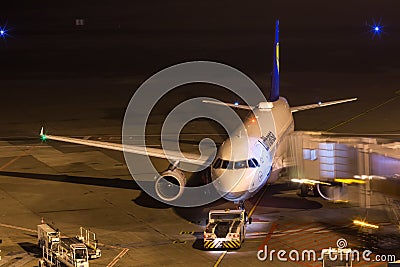 Cologne, North Rhine-Westphalia/germany - 26 11 18: lufthansa airplane at airport cologne bonn germany at night Editorial Stock Photo