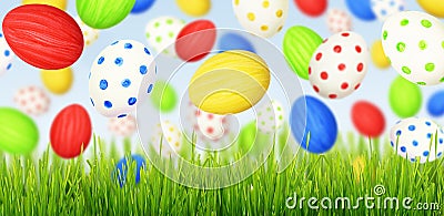 Cololrful Easter eggs falling at green grass Stock Photo