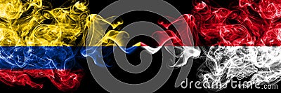 Colombia, Colombian vs Monaco, Monacan smoky mystic flags placed side by side. Thick colored silky abstract smokes flags Stock Photo