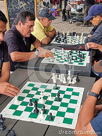 Colombia, Medellin, chess players outdoors Editorial Stock Photo