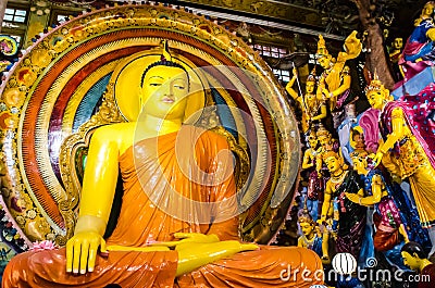 Colombo/Srilanka December 27th: Buddha statue in Gangaramaya Temple in Colombo, Srilanka Stock Photo