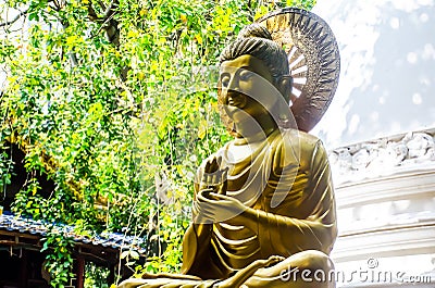 Colombo/Srilanka December 2019: Golden Buddha statue in Gangaramaya Temple in Colombo, Srilanka Stock Photo